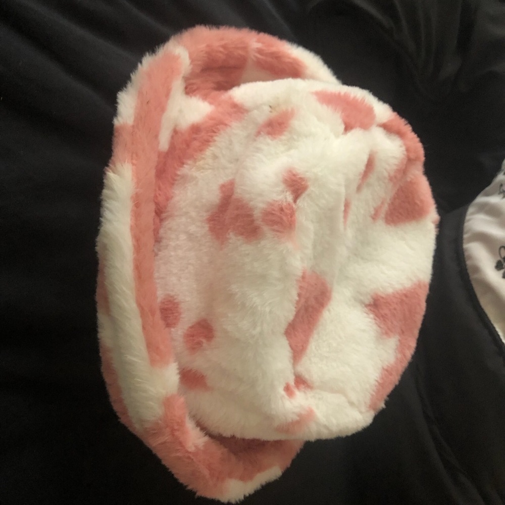 Fluffy pink and white cow print bucket hat